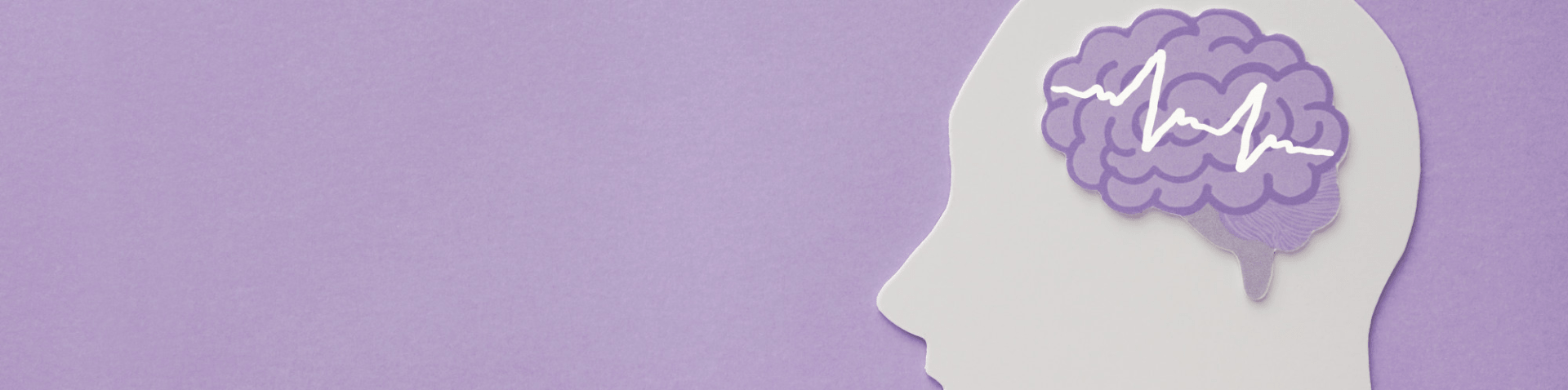 encephalography-brain-paper-cutout-on-purple-background-epilepsy-and-alzheimer-awareness-seizure-disorder-mental-health-concept-min-1.png